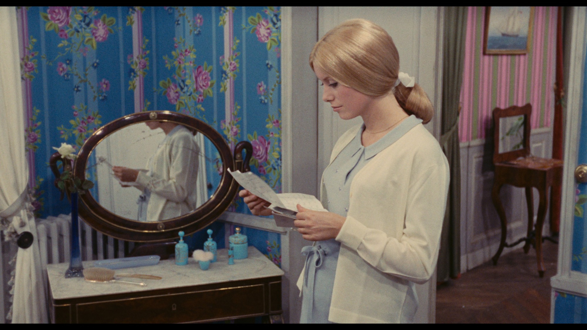 Screen capture from The Umbrellas of Cherbourg