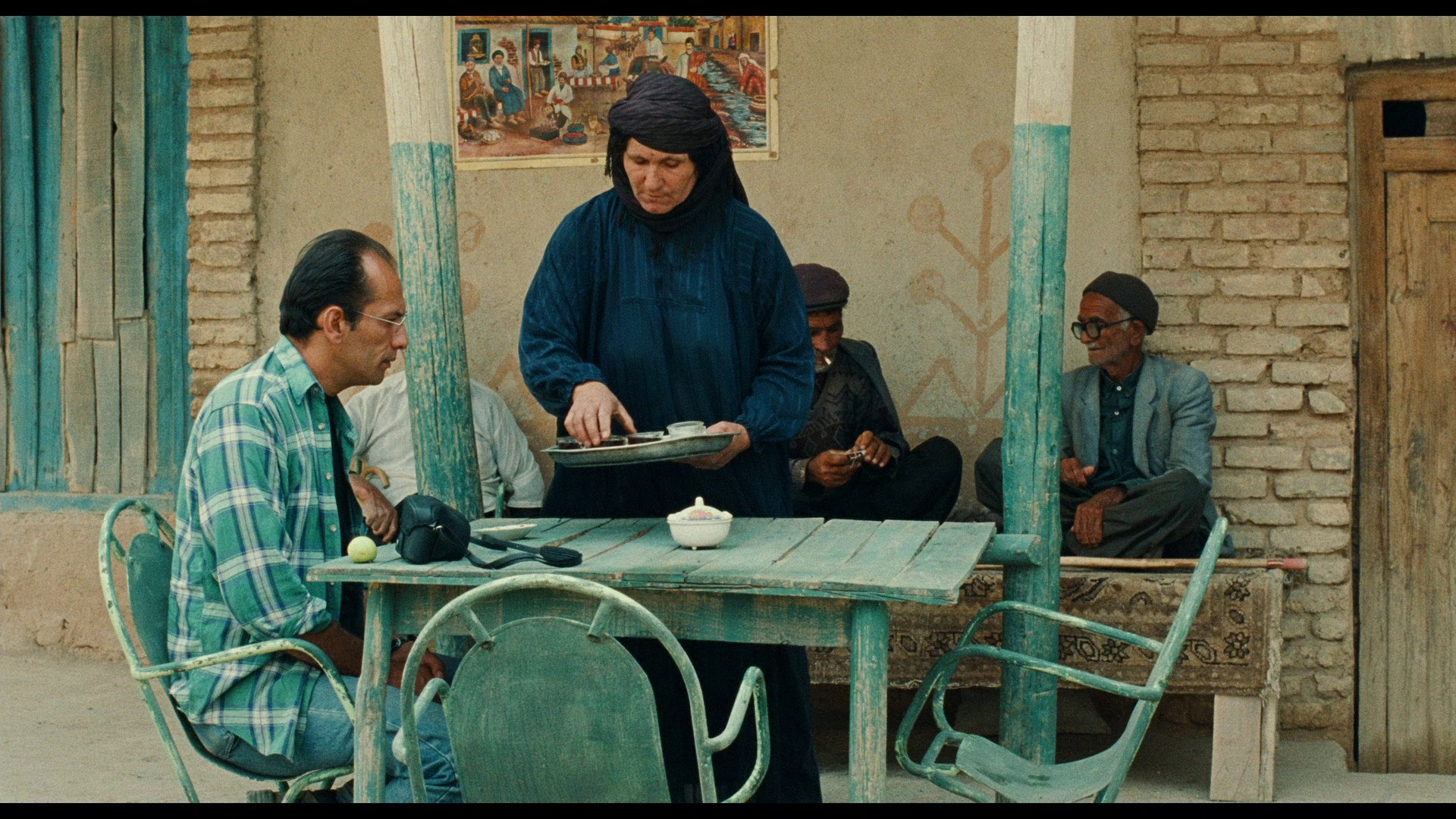 Screen capture from The Wind Will Carry Us