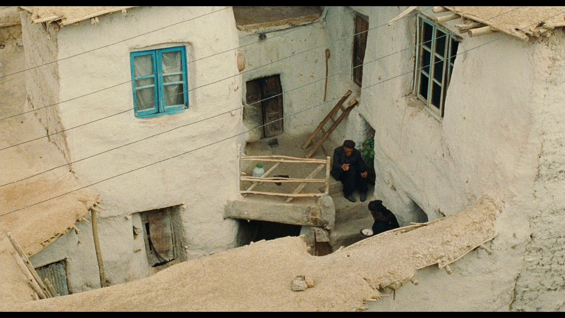 Screen capture from The Wind Will Carry Us