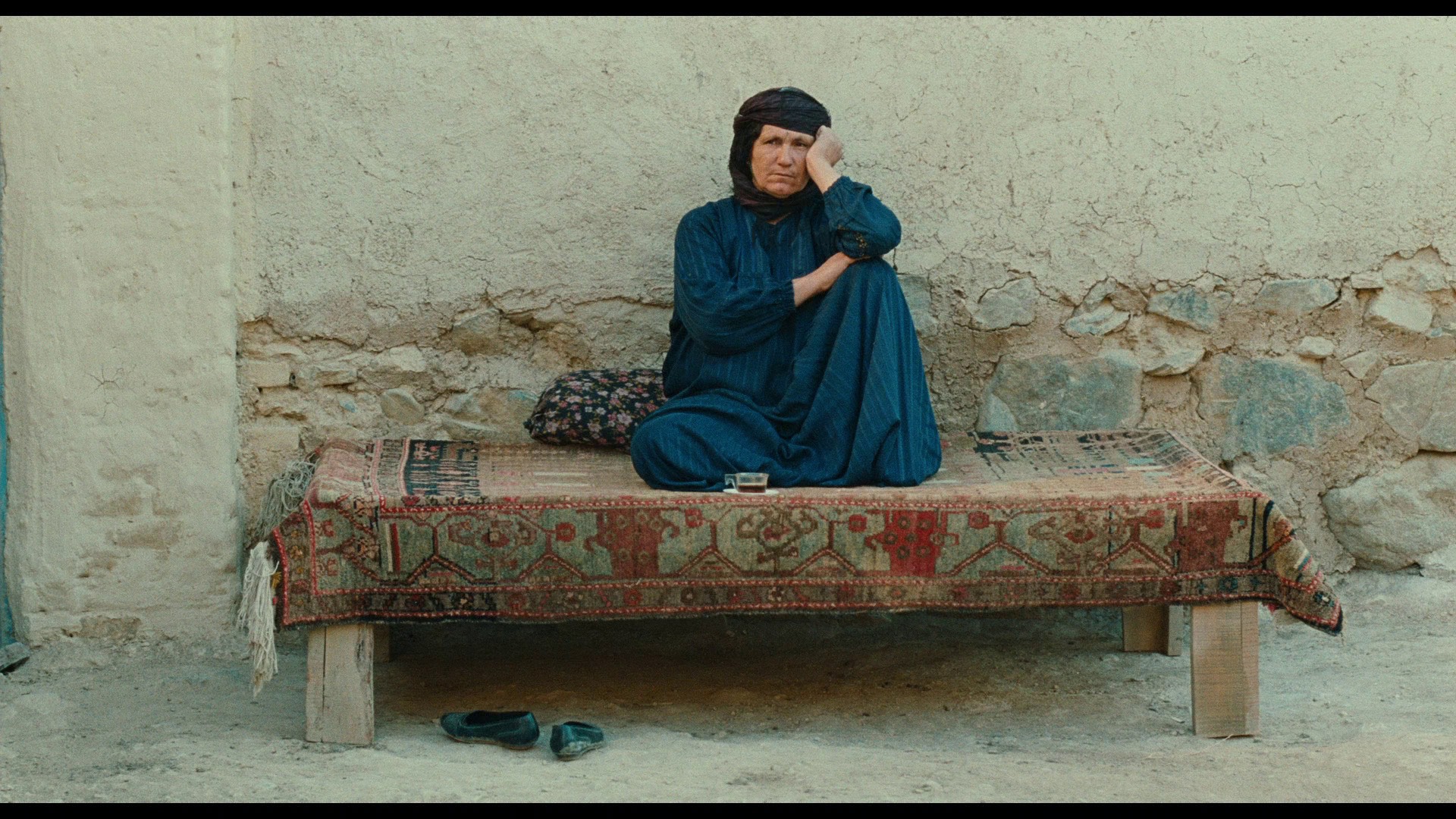 Screen capture from The Wind Will Carry Us