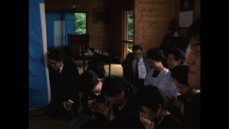 Screen capture from The Funeral