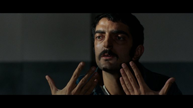 Screen capture from The Bird with the Crystal Plumage