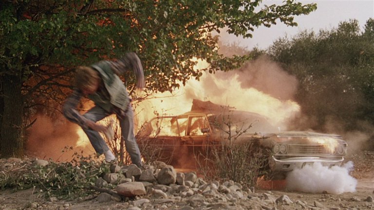 Screen capture from The Hit