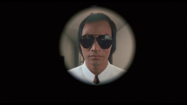 Screen capture from Yes, Madam!