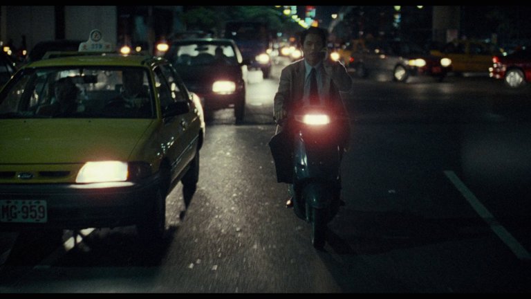 Screen capture from A Confucian Confusion / Mahjong: Two Films by Edward Yang