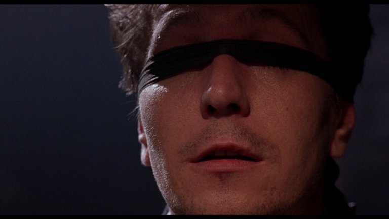 Screen capture from Romeo is Bleeding