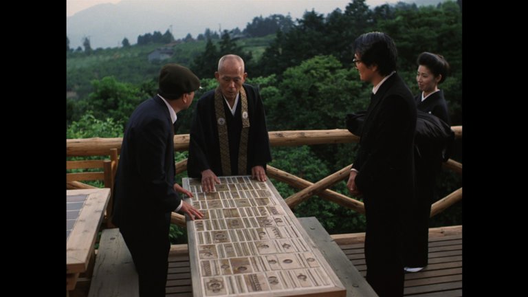 Screen capture from The Funeral