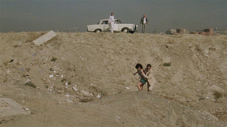 Screen capture from The Hit