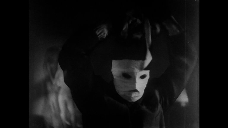 Screen capture from The Invisible Man Appears/The Invisible Man Vs. The Human Fly