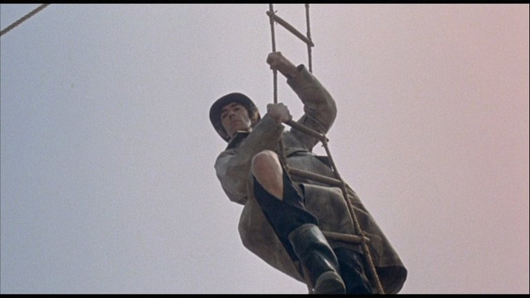 Screen capture from The Bed Sitting Room
