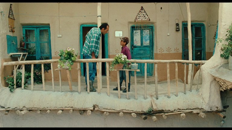 Screen capture from The Wind Will Carry Us