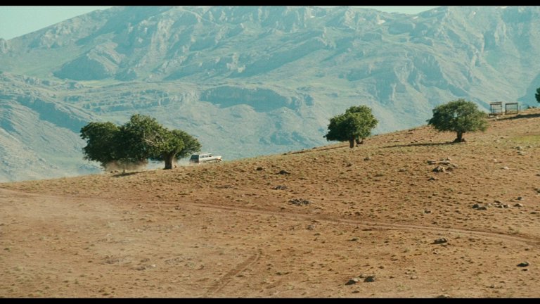 Screen capture from The Wind Will Carry Us