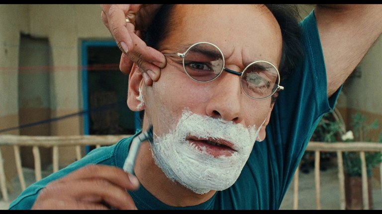 Screen capture from The Wind Will Carry Us