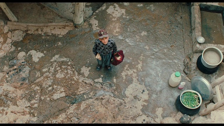 Screen capture from The Wind Will Carry Us