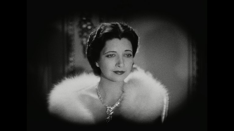 Screen capture from Trouble in Paradise