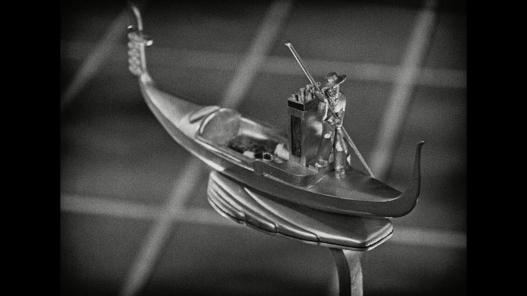 Screen capture from Trouble in Paradise