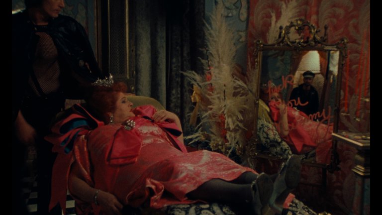 Screen capture from Desperate Living