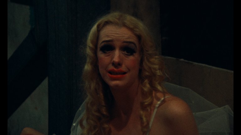 Screen capture from Desperate Living
