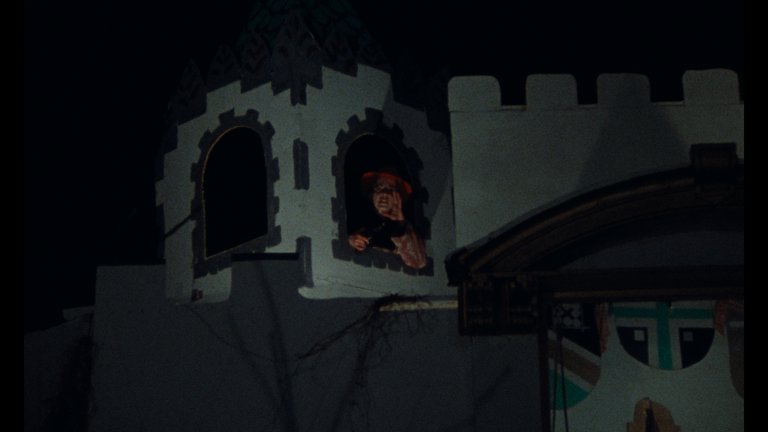 Screen capture from Desperate Living