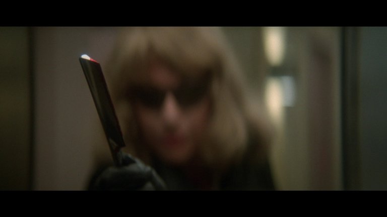 Screen capture from Dressed to Kill