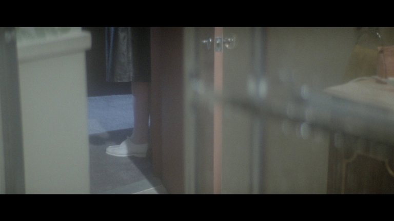 Screen capture from Dressed to Kill