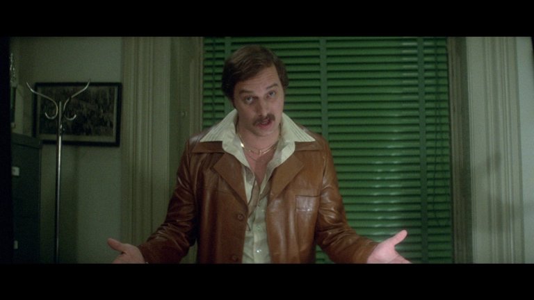 Screen capture from Dressed to Kill