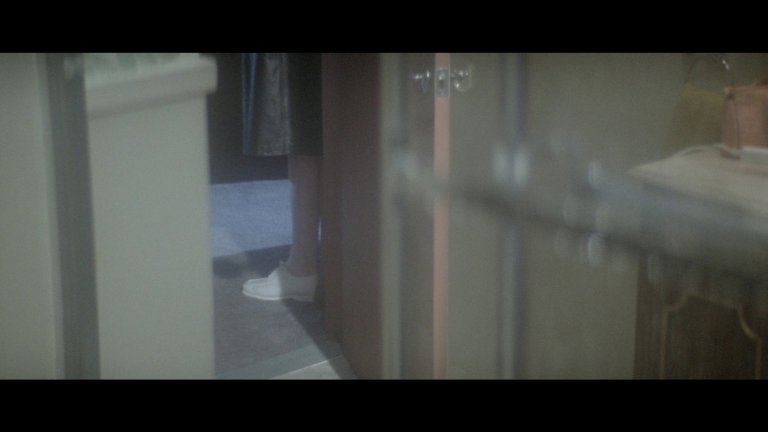 Screen capture from Dressed to Kill