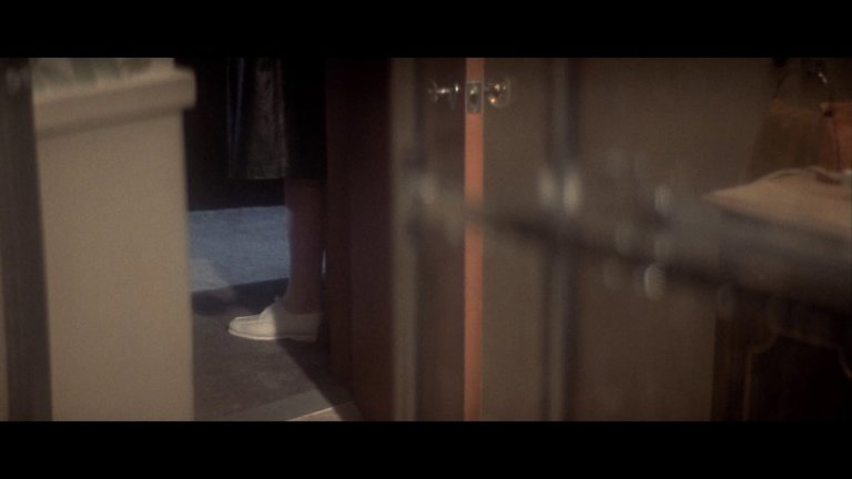 Screen capture from Dressed to Kill