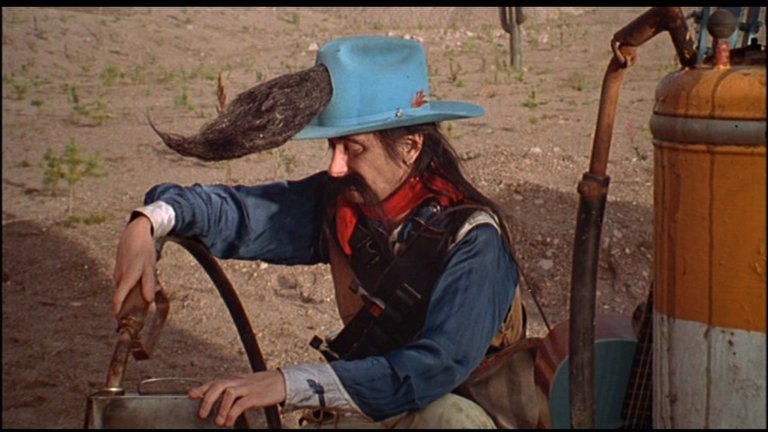 Screen capture from Aki Kaurismäki’s Leningrad Cowboys