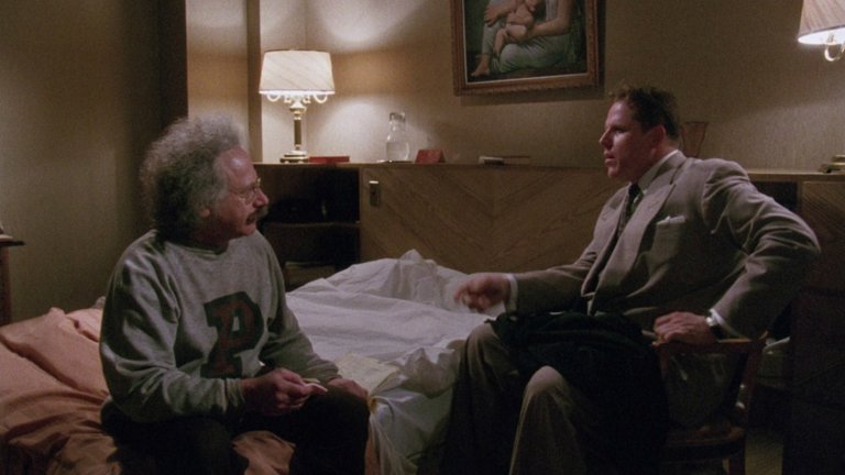 Screen capture from Insignificance
