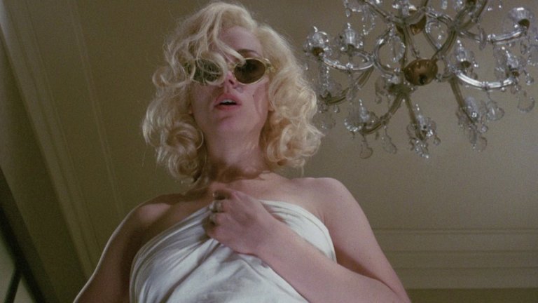 Screen capture from Insignificance