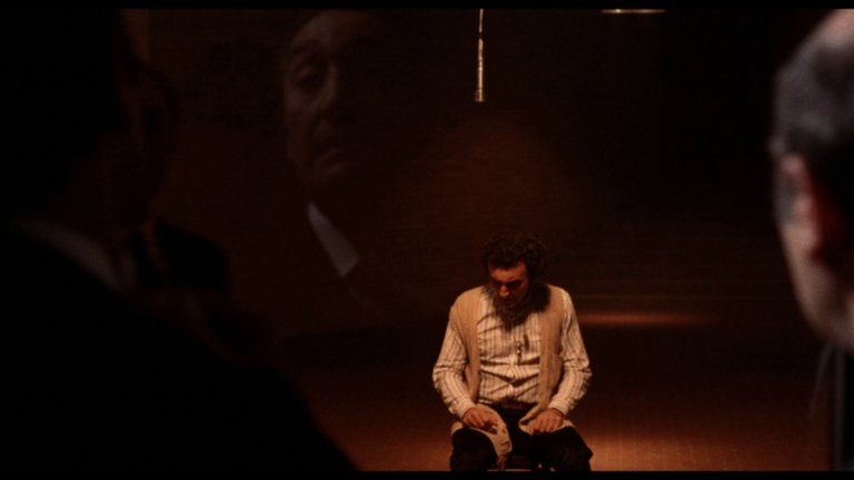 Screen capture from Investigation of a Citizen Above Suspicion