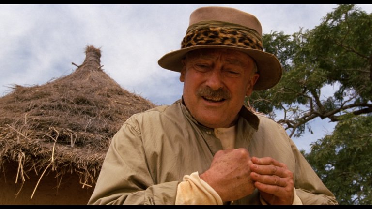 Screen capture from Mister Johnson