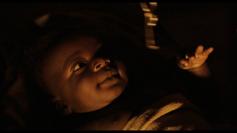 Screen capture from Mister Johnson