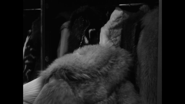 Screen capture from The Earrings of Madame de . . .