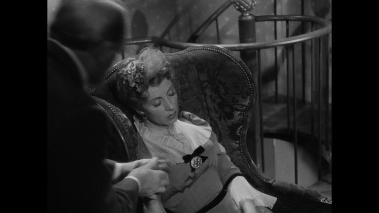 Screen capture from The Earrings of Madame de . . .