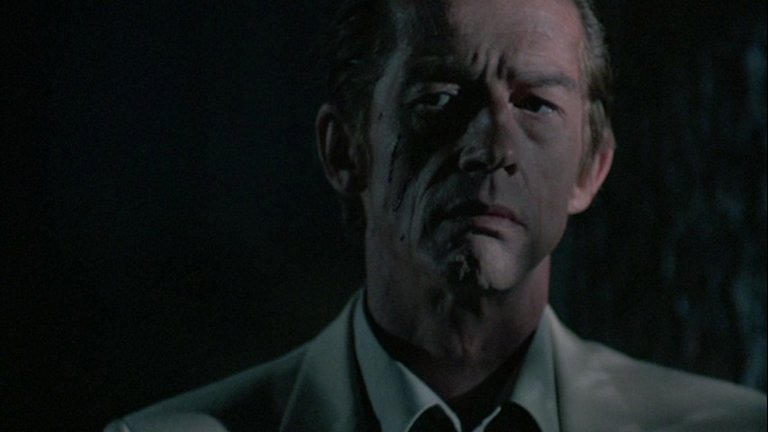 Screen capture from The Hit